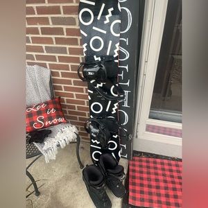 Ride 143in.snowboard with bindings and size 9.5women’s Kiana Snowboarding boots.